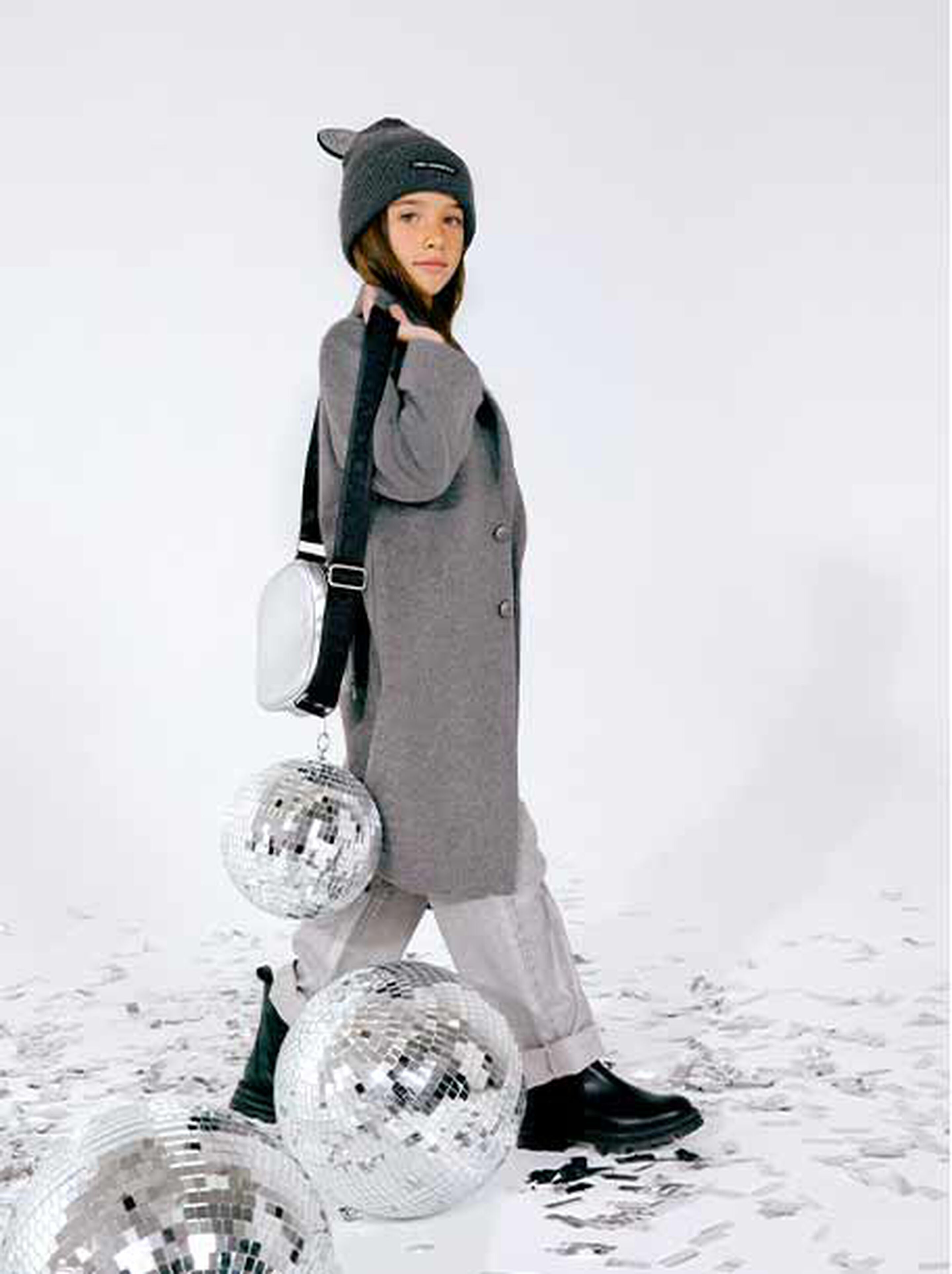 Girl getting ready for New Year’s Eve in a stylish dress