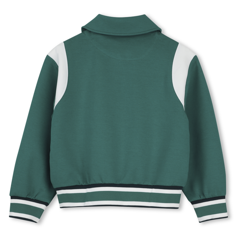 VEST MET DRUKKNOPEN KIDS AROUND 
                        GIRL