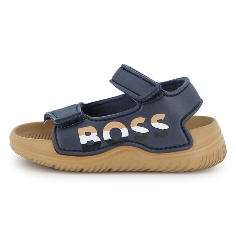 KLITTENBANDSLUITINGEN BOSS 
                        BOY