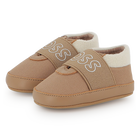 Zachte pantoffels van schapenvacht BOSS 
                    UNISEX