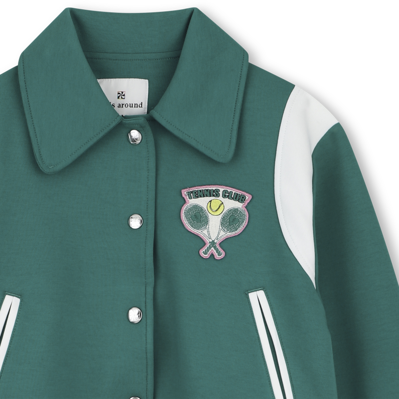 VEST MET DRUKKNOPEN KIDS AROUND 
                        GIRL