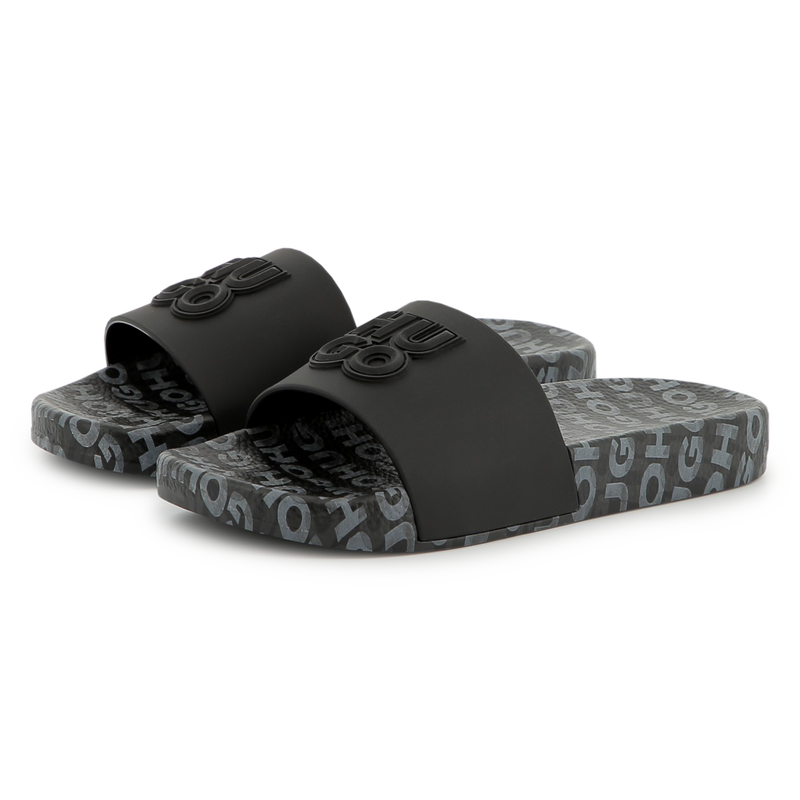 Lichte slippers met badges HUGO 
                        BOY