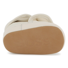 Zachte pantoffels van schapenvacht BOSS 
                    UNISEX