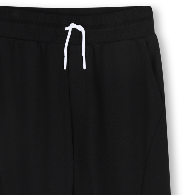 BROEK MET ZAKKEN DKNY 
                        UNISEX