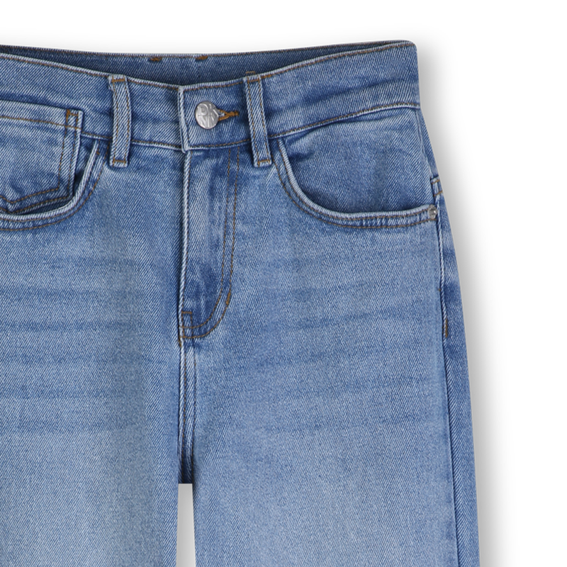 JEANS MET 5 ZAKKEN DKNY 
                        UNISEX