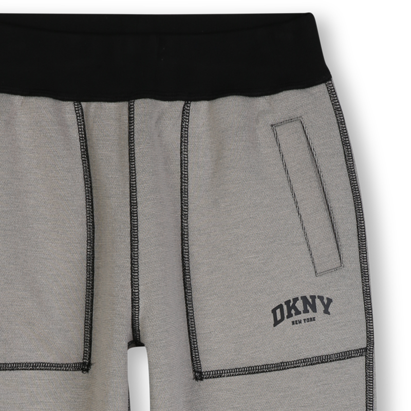 Reversible broek DKNY 
                        BOY