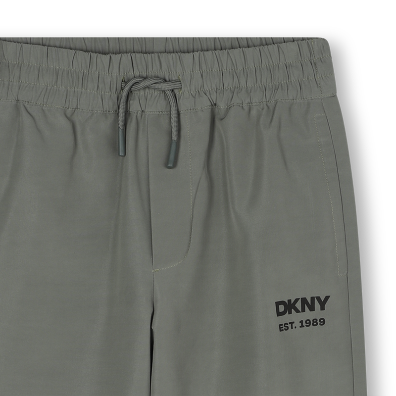 Waterafstotende broek DKNY 
                        BOY