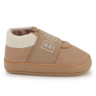 Zachte pantoffels van schapenvacht BOSS 
                    UNISEX