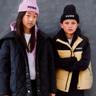 Gebreide muts HUGO 
                    GIRL