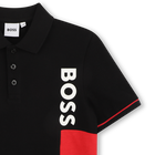 POLO MET KORTE MOUWEN BOSS 
                    JONGEN